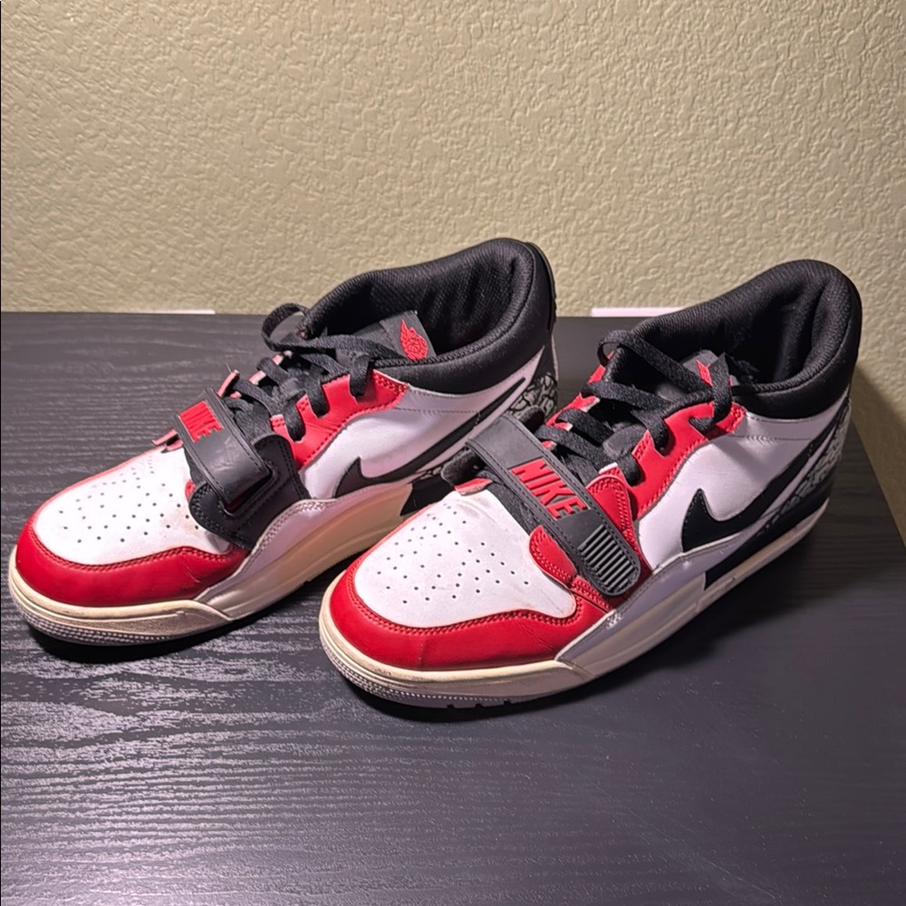 Nike Red and Black Sneakers with Bold Design